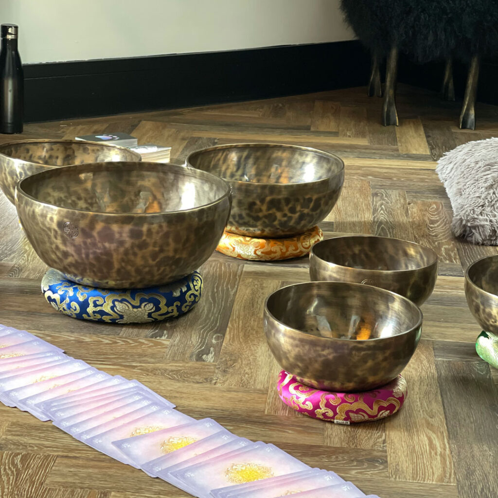 Sound bowls and tarot cards.