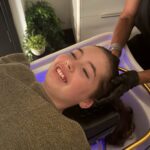 A girl is having a Japanese Head Spa massage.